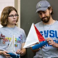 Students wait for their turn to race